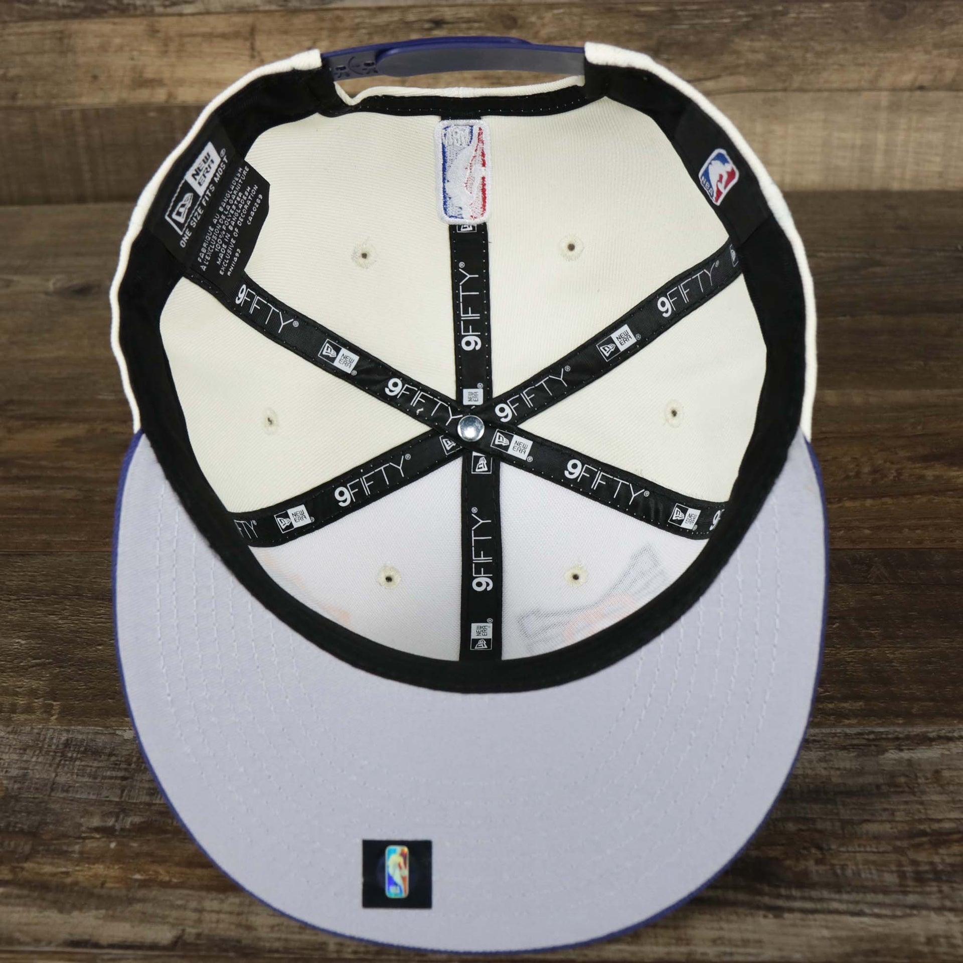 The underside of the Phoenix Suns NBA 2022 Draft Gray Bottom 9Fifty Snapback | New Era Cream/Purple