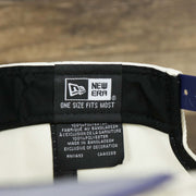 The New Era Tag on the Phoenix Suns NBA 2022 Draft Gray Bottom 9Fifty Snapback | New Era Cream/Purple