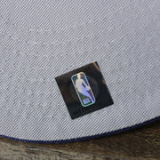 The NBA Jerry West Sticker on the Phoenix Suns NBA 2022 Draft Gray Bottom 9Fifty Snapback | New Era Cream/Purple