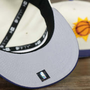 The Gray Undervisor on the Phoenix Suns NBA 2022 Draft Gray Bottom 9Fifty Snapback | New Era Cream/Purple