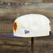 The wearer's left on the Phoenix Suns NBA 2022 Draft Gray Bottom 9Fifty Snapback | New Era Cream/Purple