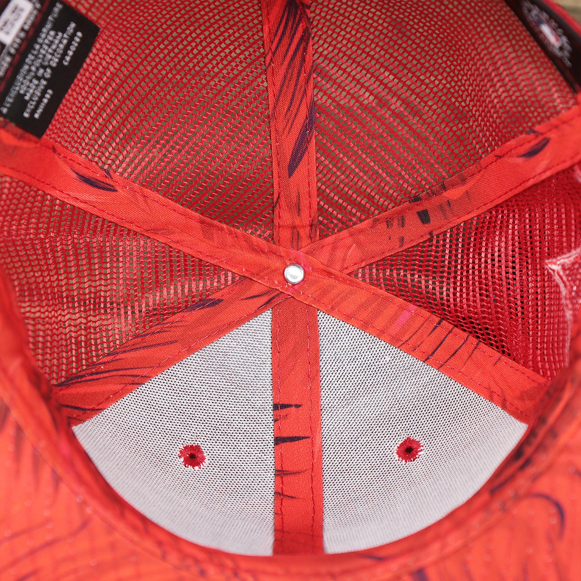 The inside of the Washington Nationals Metallic All Star Game MLB 2022 Side Patch 9Fifty Mesh Snapback | ASG 2022 Red Trucker Hat