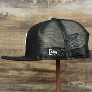 The wearer's left on the Chicago White Sox Metallic All Star Game MLB 2022 Side Patch 9Fifty Mesh Snapback | ASG 2022 Black Trucker Hat