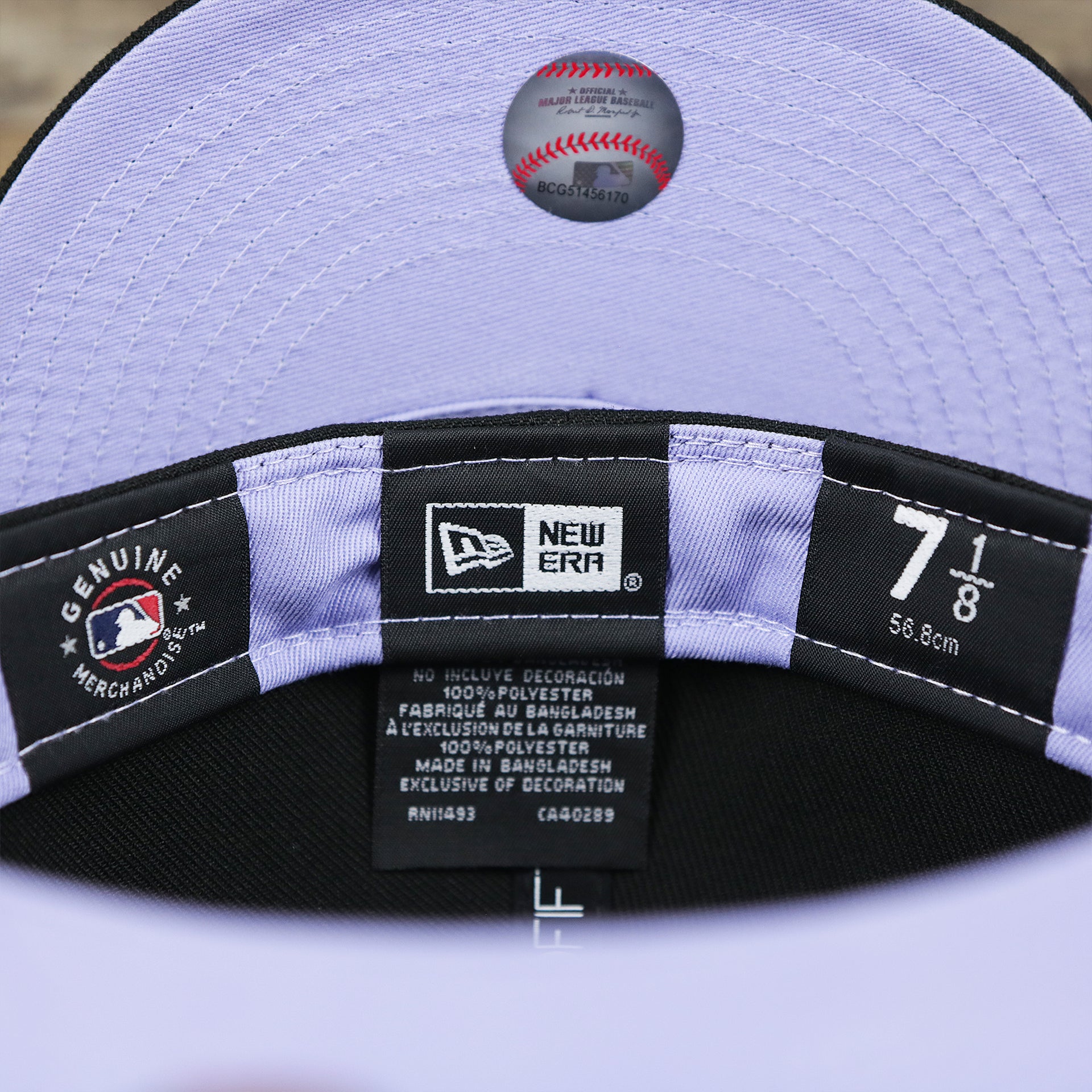 The Tags on the Chicago White Sox Pop Sweat Pastel World Series Side Patch Fitted Cap With Purple Undervisor | Black 59Fifty Cap