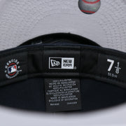 The tags on the New York Yankees Lady Liberty Side Patch Gray Bottom 59Fifty Fitted Cap | Navy Blue 59Fifty Cap