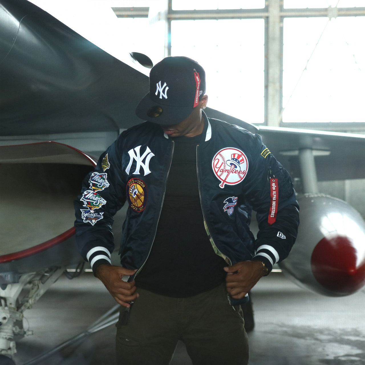 The New York Yankees MLB Patch Alpha Industries Reversible Bomber Jacket With Camo Liner | Navy Blue Bomber Jacket opened