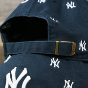 The Navy adjustable Strap on the Women’s New York Yankees All Over Yankees Logo Dad Hat | Navy Women’s Dad Hat