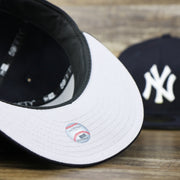 The undervisor on the New York Yankees Gray Bottom Wool 59Fifty Fitted Cap | Navy Blue 59Fifty Cap