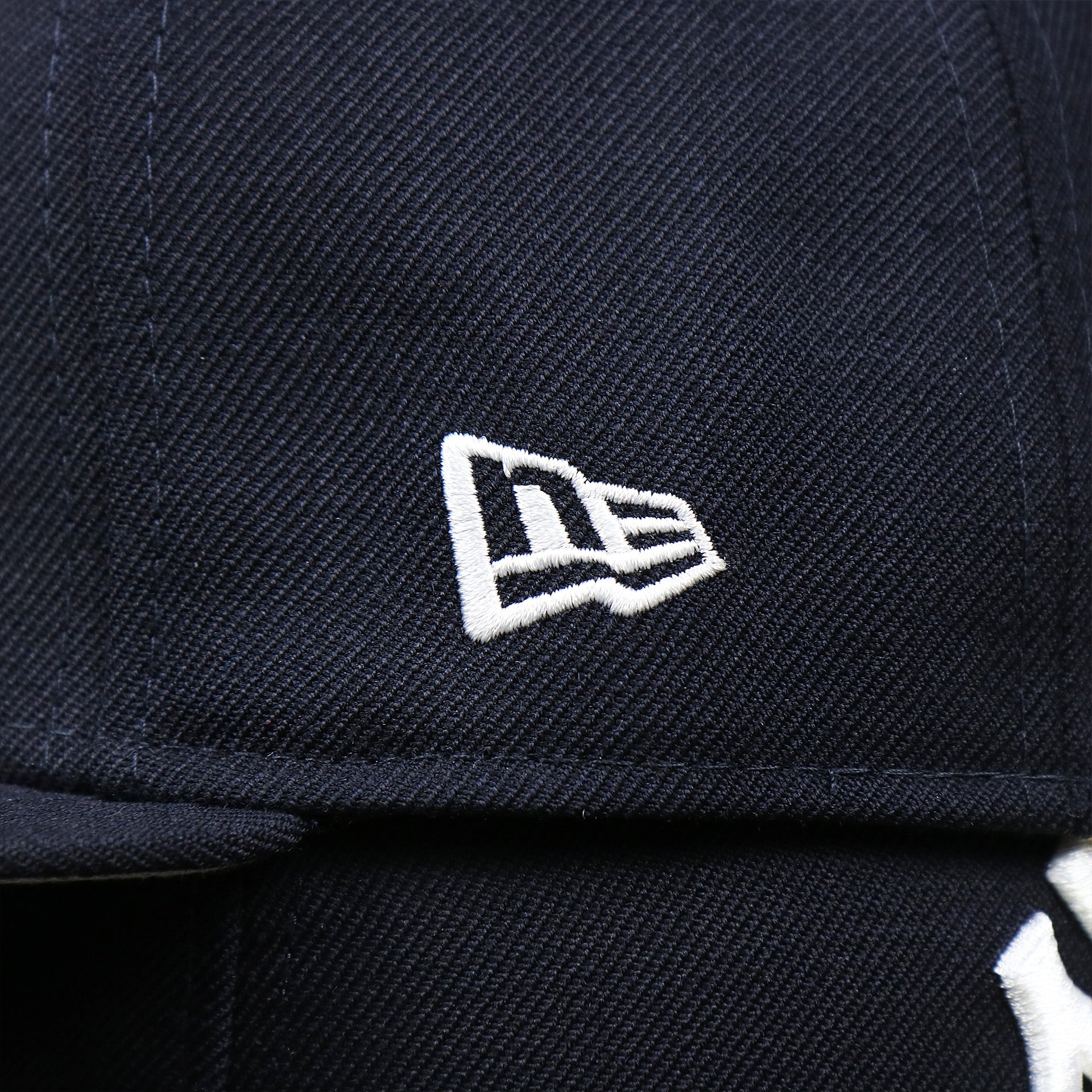 The New Era Logo on the New York Yankees Gray Bottom Wool 59Fifty Fitted Cap | Navy Blue 59Fifty Cap