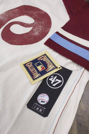 the Philadelphia Phillies Throwback Vintage 2-Tone T-Shirt | Distressed Phils Logo Cooperstown Collection Heritage Opener Tee has several authentic vintage details and a cooperstown collection tag
