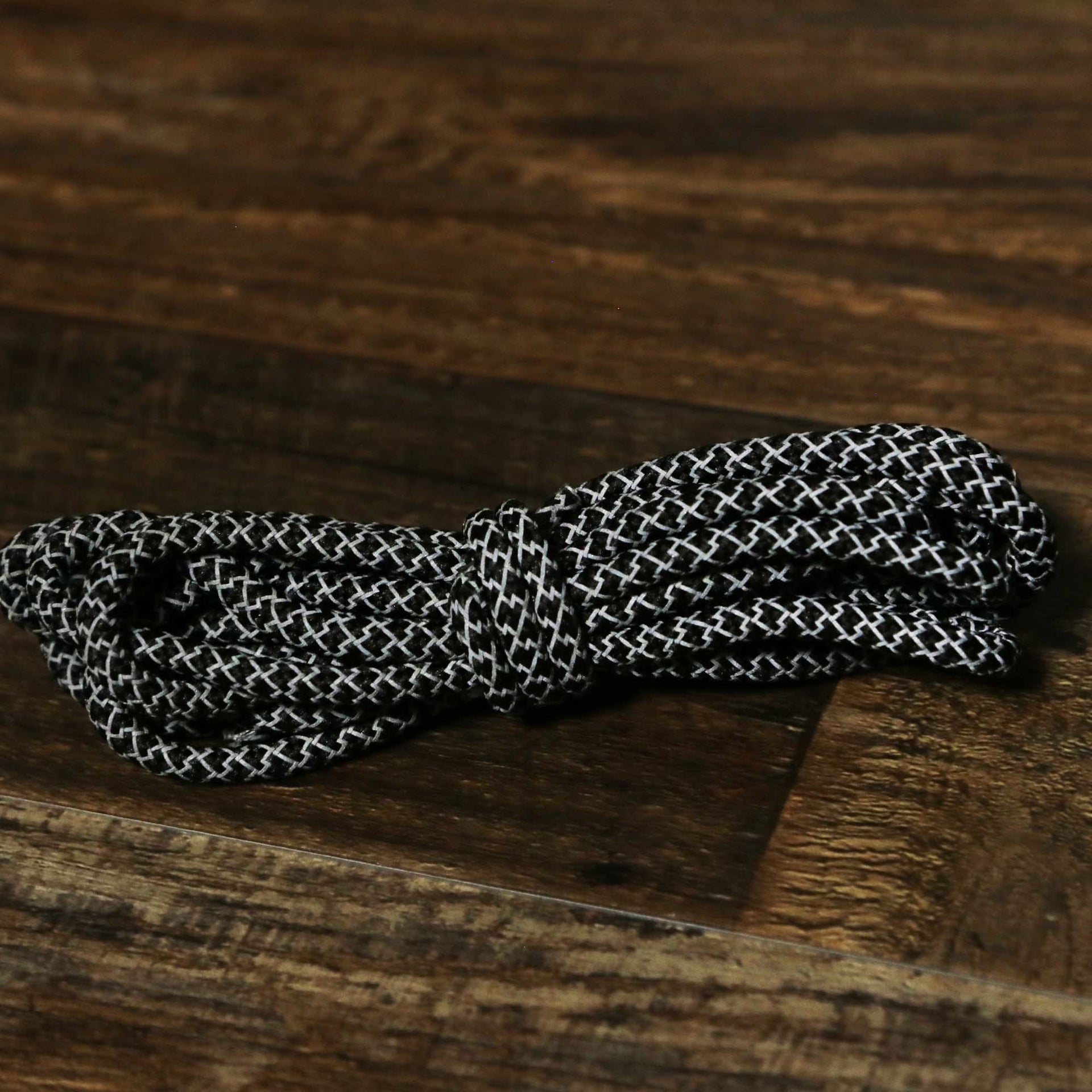 The 3M Reflective Black Solid Shoelaces with Black Aglets | 120cm Capswag folded up