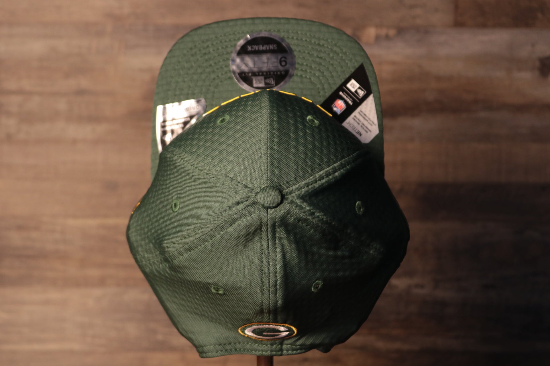 Packers 2020 Training Camp Snapback Hat | Green Bay Packers 2020 On-Field Green Training Camp Snap Cap the top of this cap is green