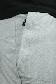 One of the two zipped pockets of the Jordan Craig french terry shorts.