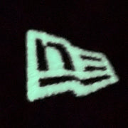 Glow in the dark New Era logo on the Philadelphia Athletics Glow In The Dark Oakland 40 Year Patch Teal Bottom Side Patch 59Fifty Fitted Cap