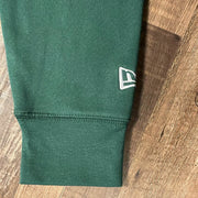 Close up of the New Era flag embroidered on the Oakland Athletics "City Cluster" 59Fifty Fitted Matching Green Pullover Hoodie