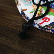 A close up of the chin strap on the Philadephia Phillies Straw Life Guard Hat Reyn Spooner