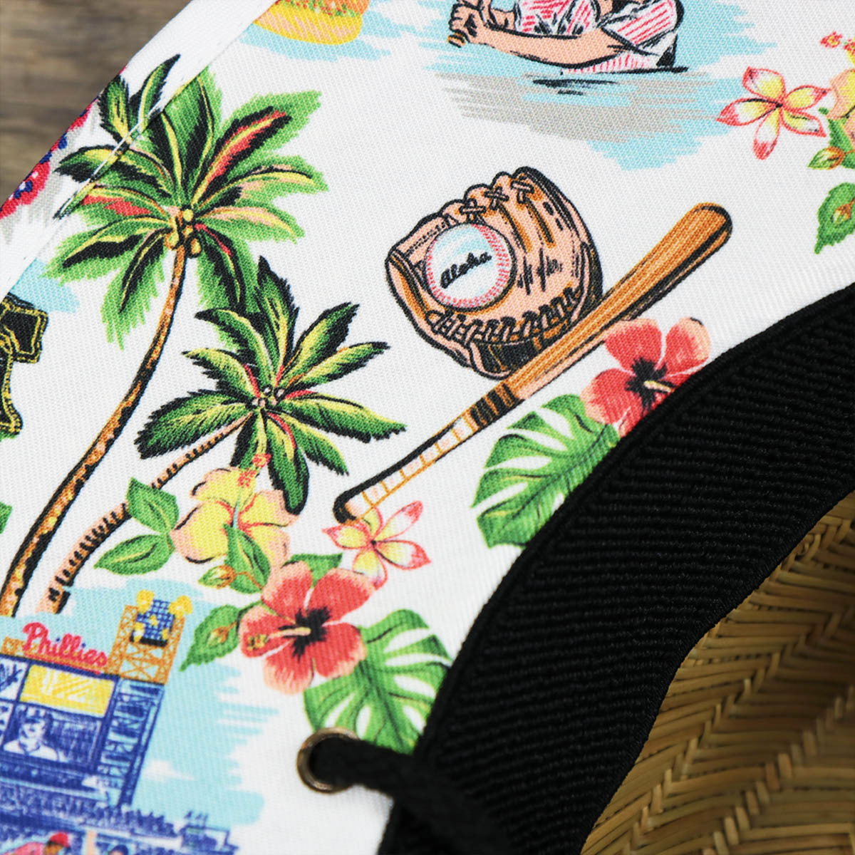 A close up of the Hawaiian patterns in the Philadephia Phillies Straw Life Guard Hat Reyn Spooner