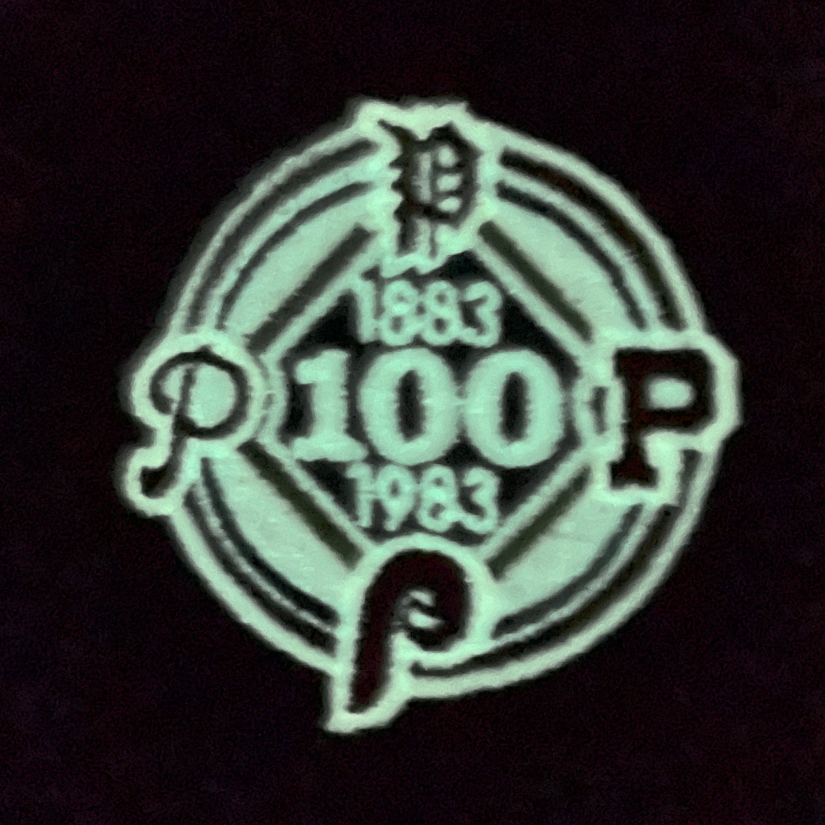 Glow in the dark side patch of the Philadelphia Phillies Glow In The Dark 100th Anniversary Teal Bottom Side Patch 59Fifty Fitted Cap