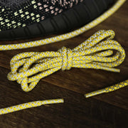 The 3M Reflective Yellow Solid Shoelaces with Yellow Aglets | 120cm Capswag folded up and reflecting