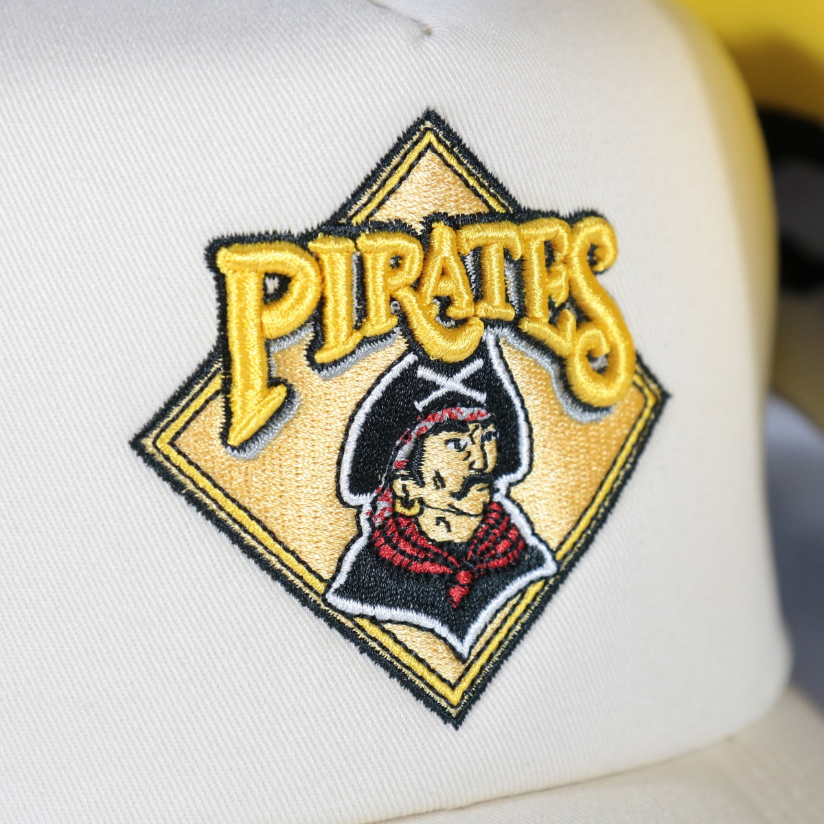 pirates logo on the Pittsburgh Pirates Cooperstown Evergreen Pro Yellow bottom | Off White Trucker Hat