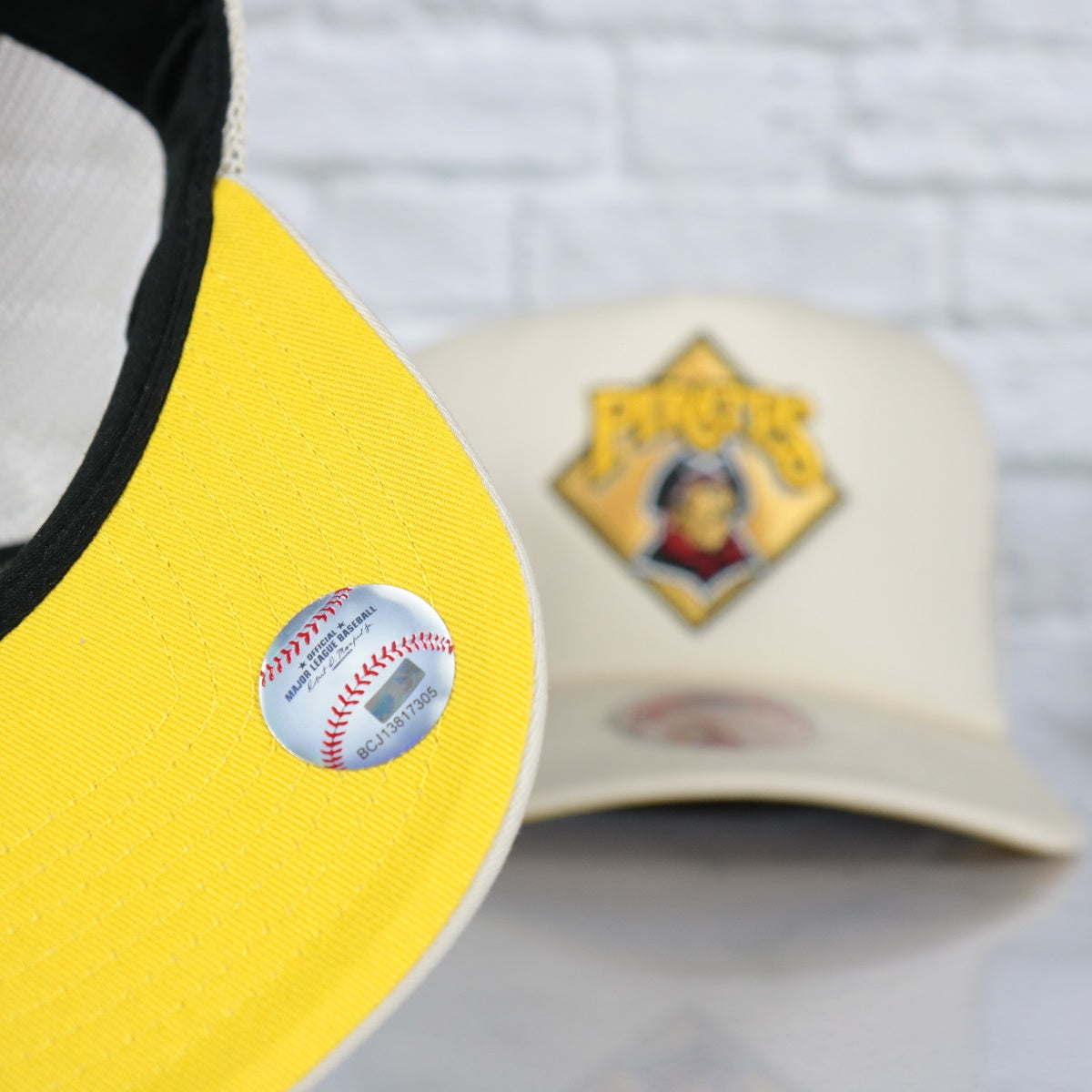 yellow undervisor on the Pittsburgh Pirates Cooperstown Evergreen Pro Yellow bottom | Off White Trucker Hat