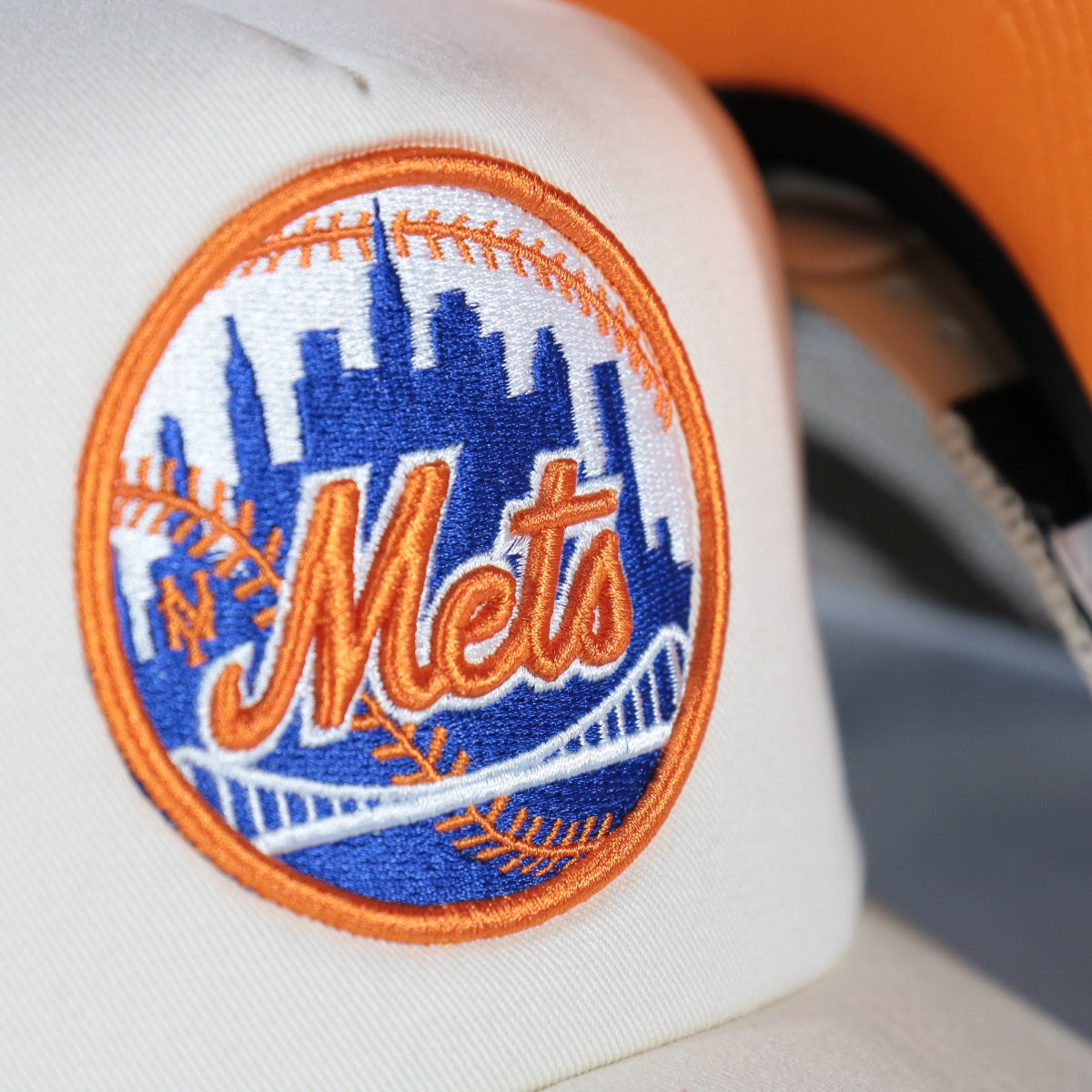 mets logo on the New York Mets Cooperstown Evergreen Pro Orange bottom | Off White Trucker Hat