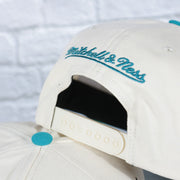 off white snap on the Charlotte Hornets Hardwood Classics Reframe Retro Green bottom | Off-White Snapback Hat