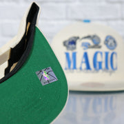 green under visor on the Orlando Magic Hardwood Classics Reframe Retro Green bottom | Off-White Snapback Hat