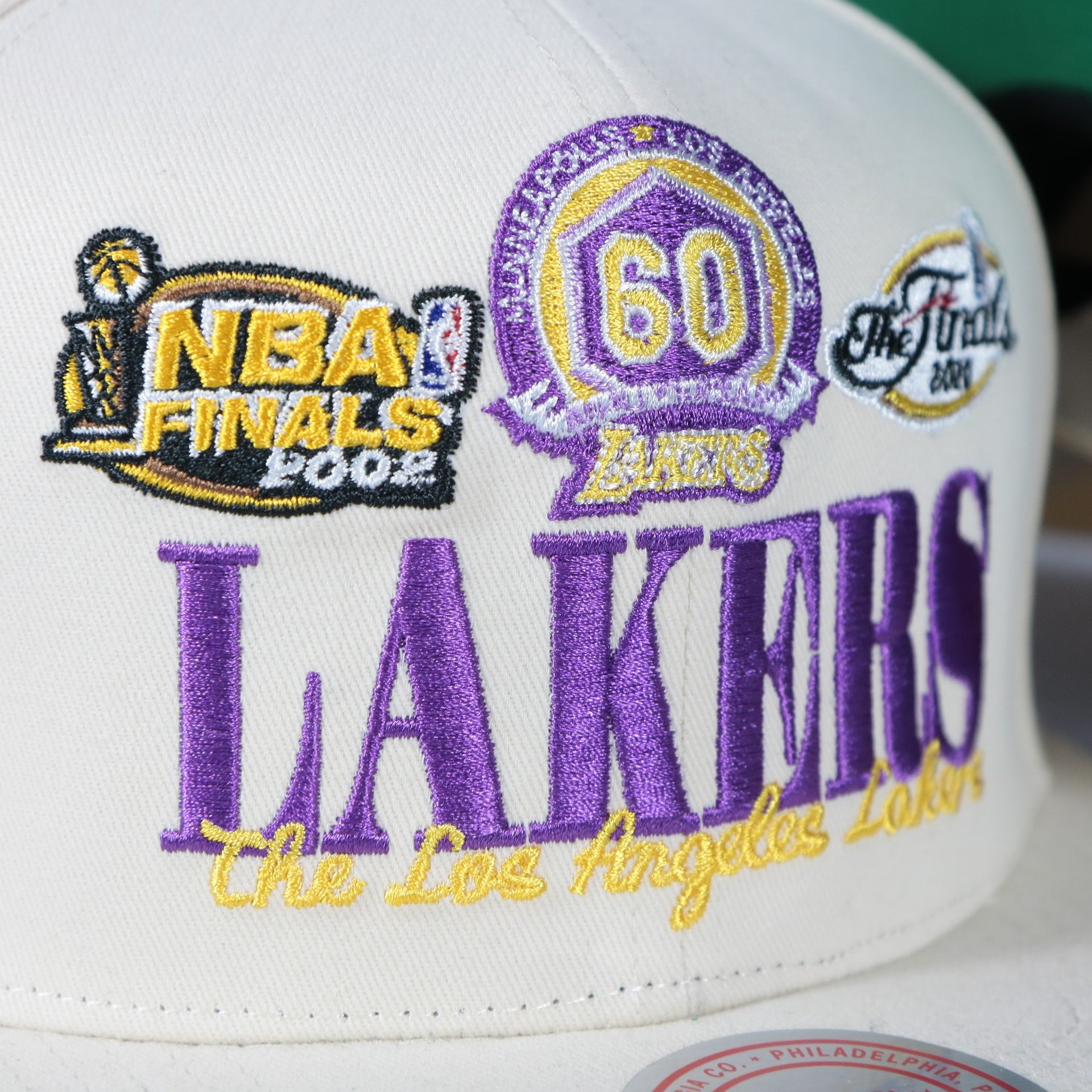 lakers vintage logos on the Los Angeles Lakers Hardwood Classics Reframe Retro Green bottom | Off-White Snapback Hat