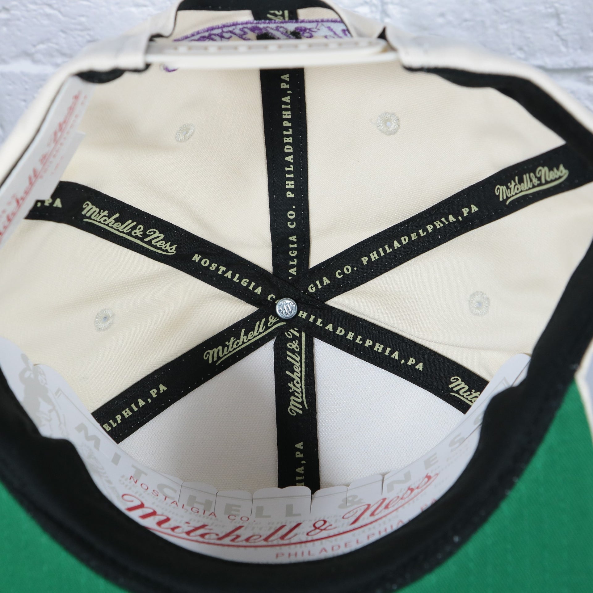 mitchell and ness taping on the Toronto Raptors Hardwood Classics Reframe Retro Green bottom | Off-White Snapback Hat