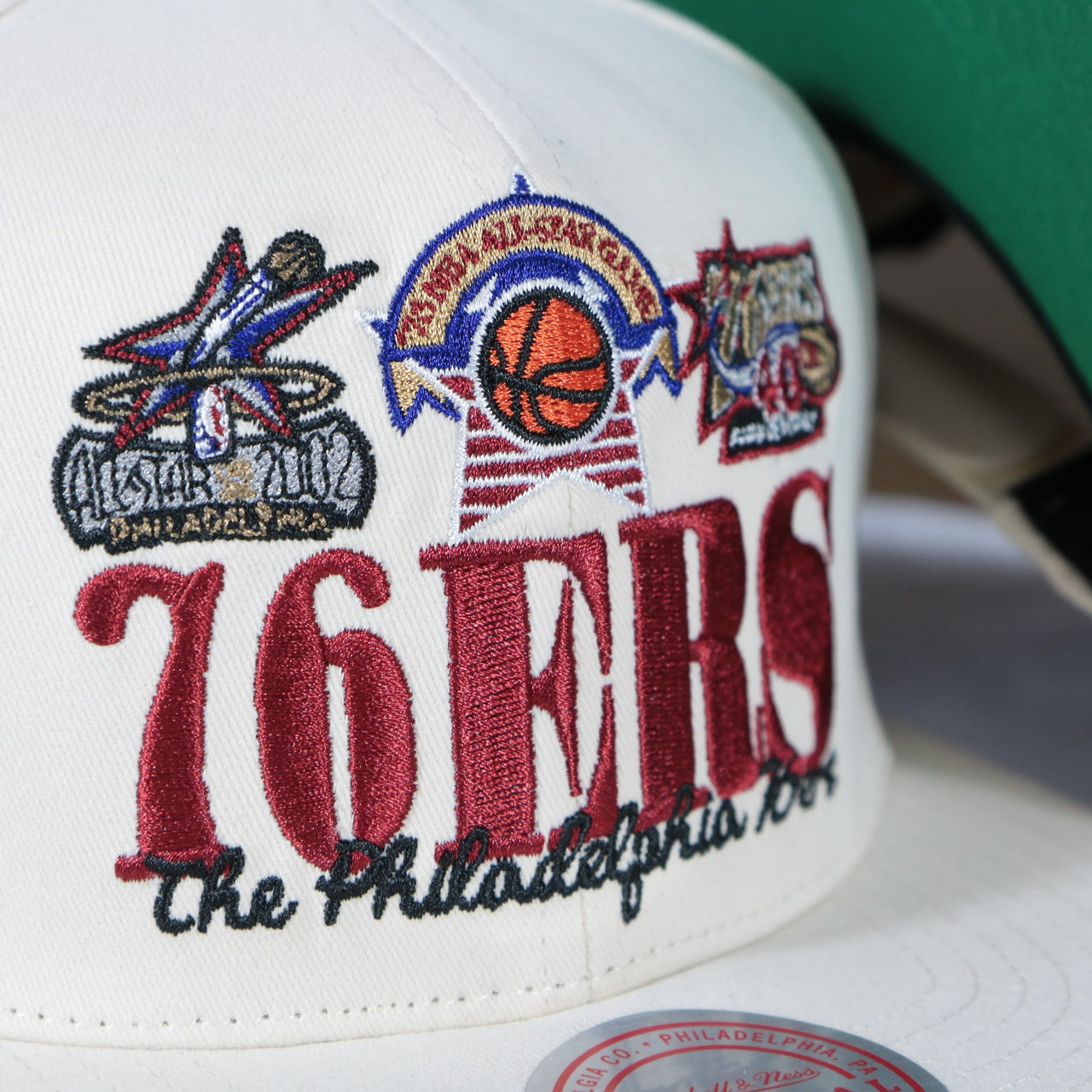 76ers vintage logos on the Philadelphia 76ers Hardwood Classics Reframe Retro Green bottom | Off-White Snapback Hat