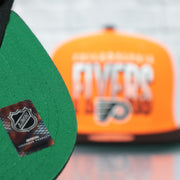 green bottom on the Philadelphia Flyers NHL Billboard 2 Green bottom Tri-Tone | Orange/White/Black Snapback Hat