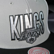 kings logo on the Los Angeles Kings NHL Billboard 2 Green bottom Tri-Tone | Gray/White/Black Snapback Hat