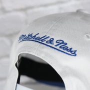 mitchell and ness logo on the New York Rangers NHL All in Pro Blue Bottom | White Snapback Hat