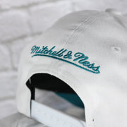 mitchell and ness logo on the Charlotte Hornets NBA Hardwood Classics All in Pro Teal Bottom | White Snapback Hat