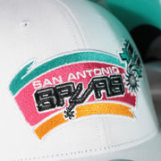 spurs logo on the San Antonio Spurs NBA Hardwood Classics All in Pro Teal Bottom | White Snapback Hat