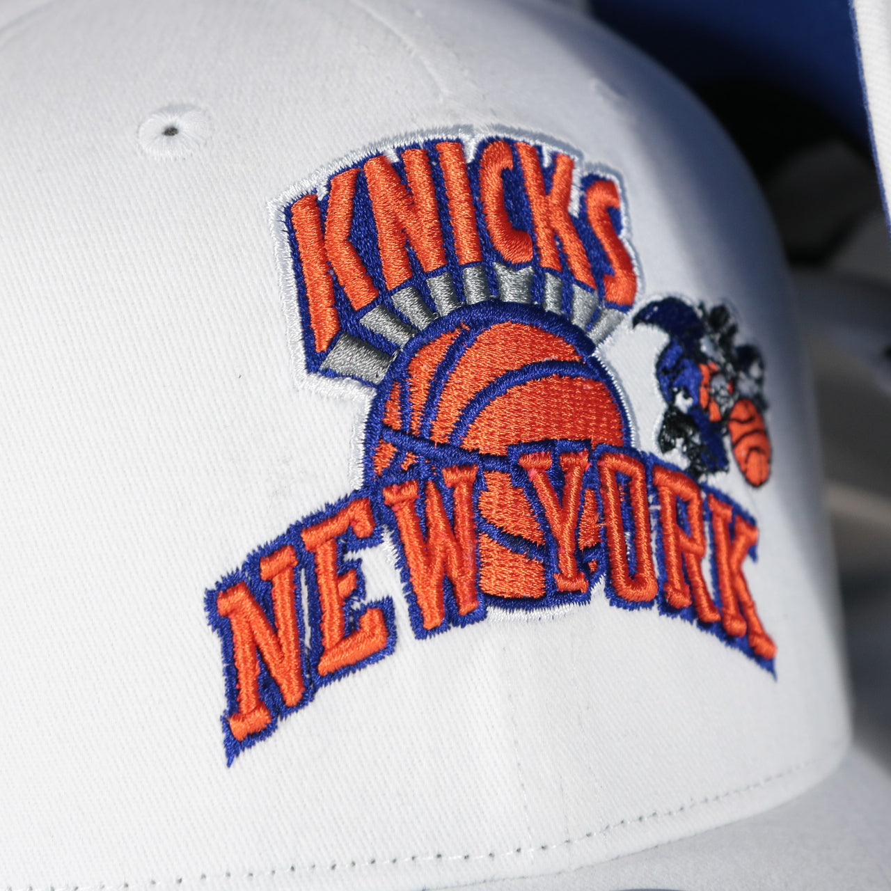 knicks logo on the New York Knicks NBA Hardwood Classics All in Pro Navy Blue Bottom | White Snapback Hat