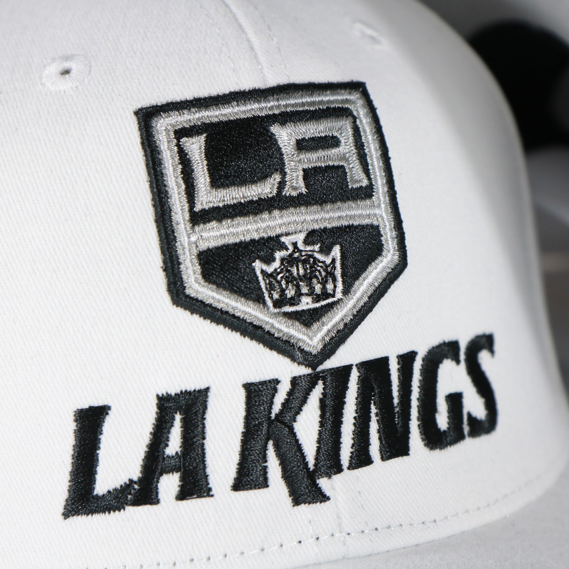 kings logo ont he Los Angeles Kings NHL All in Pro Gray Bottom | White Snapback Hat