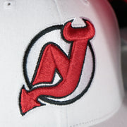 devils logo on the New Jersey Devils NHL All in Pro Red Bottom | White Snapback Hat