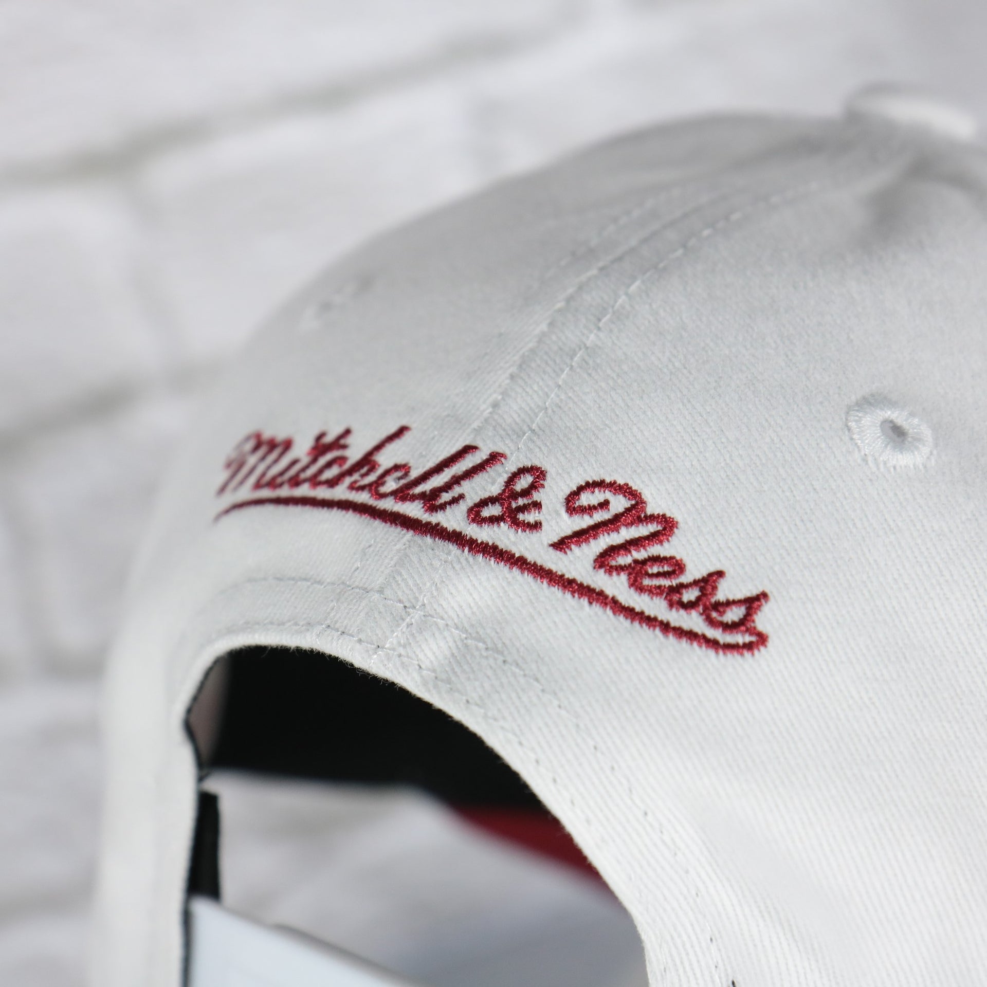 mitchell and ness logo on the Chicago Bulls NBA Hardwood Classics All in Pro Red Bottom | White Snapback Hat
