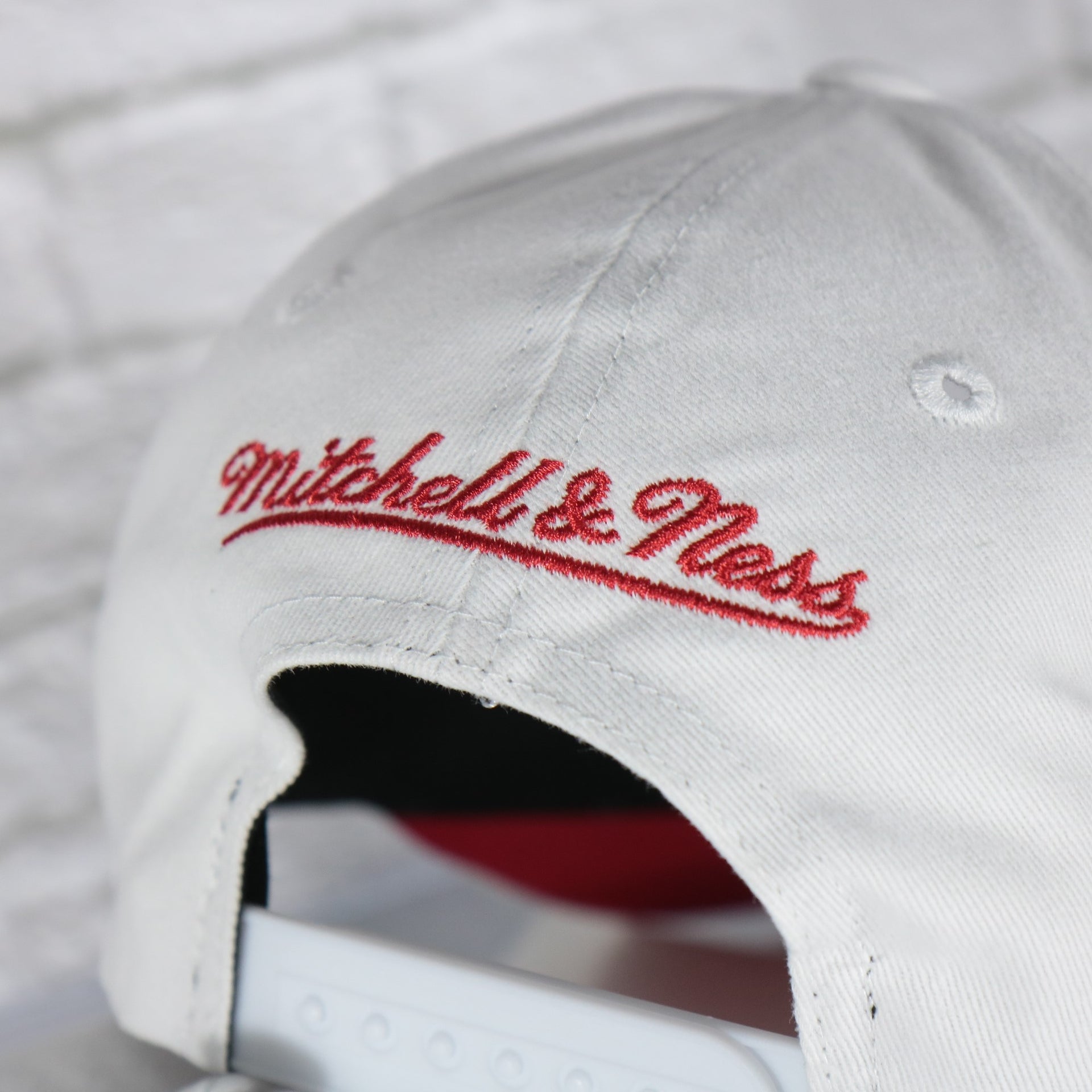 mitchell and ness logo on the Denver Nuggets NBA Hardwood Classics All in Pro Red Bottom | White Snapback Hat