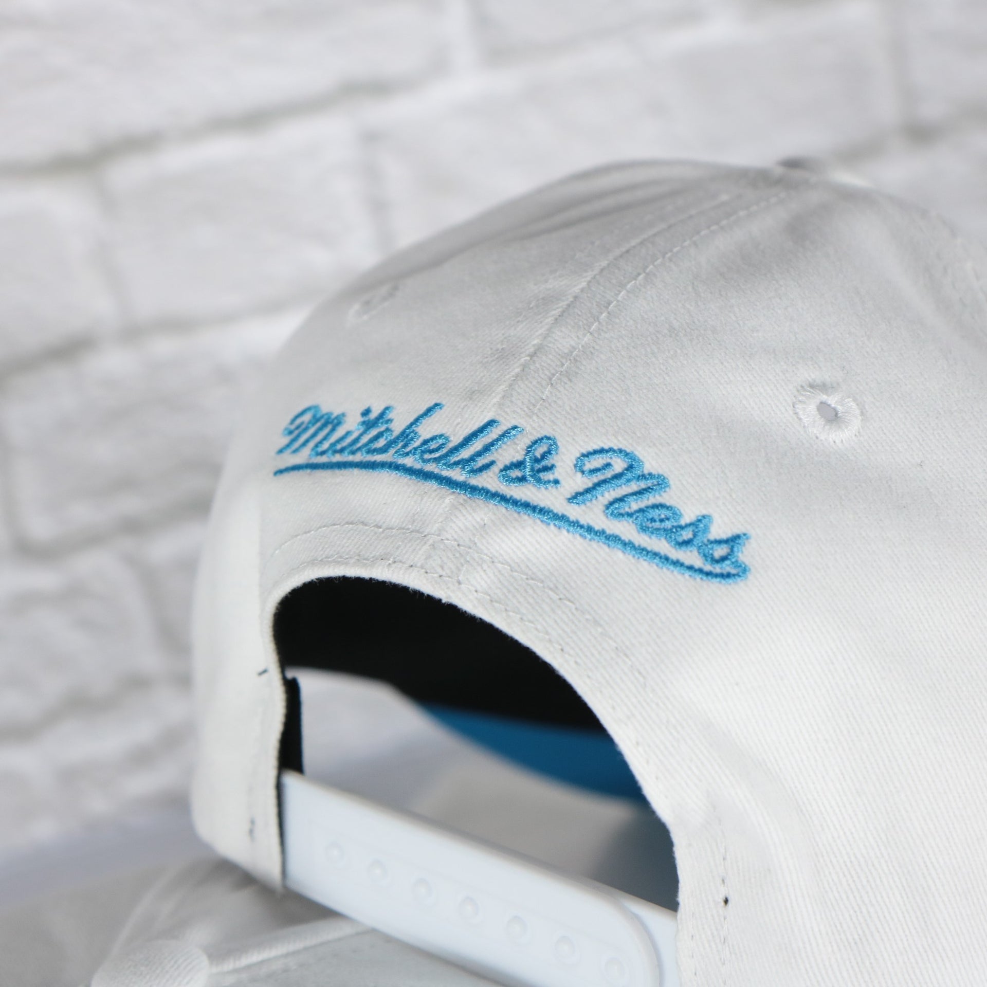 mitchell and ness logo on the Utah Jazz NBA Hardwood Classics All in Pro Blue Bottom | White Snapback Hat