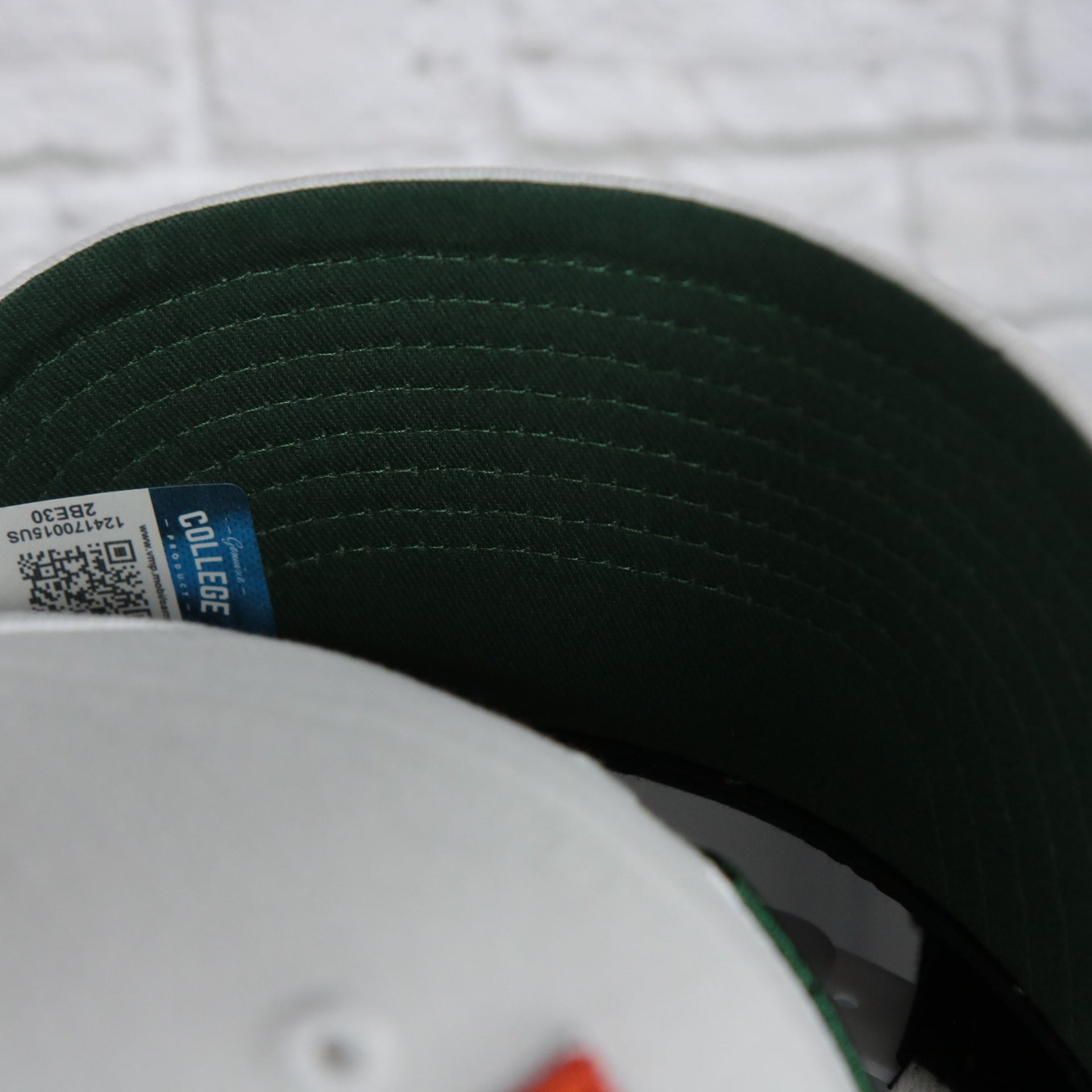 green under visor on the Miami Hurricanes NCAA All in Pro Green Bottom | White Snapback Hat