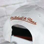 mitchell and ness logo on the Texas Longhorns NCAA All in Pro Brown Bottom | White Snapback Hat