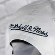mitchell and ness logo on the Michigan Wolverines NCAA All in Pro Navy Bottom | White Snapback Hat