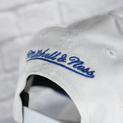 mitchell and ness logo on the Buffalo Sabres NHL All in Pro Blue Bottom | White Snapback Hat