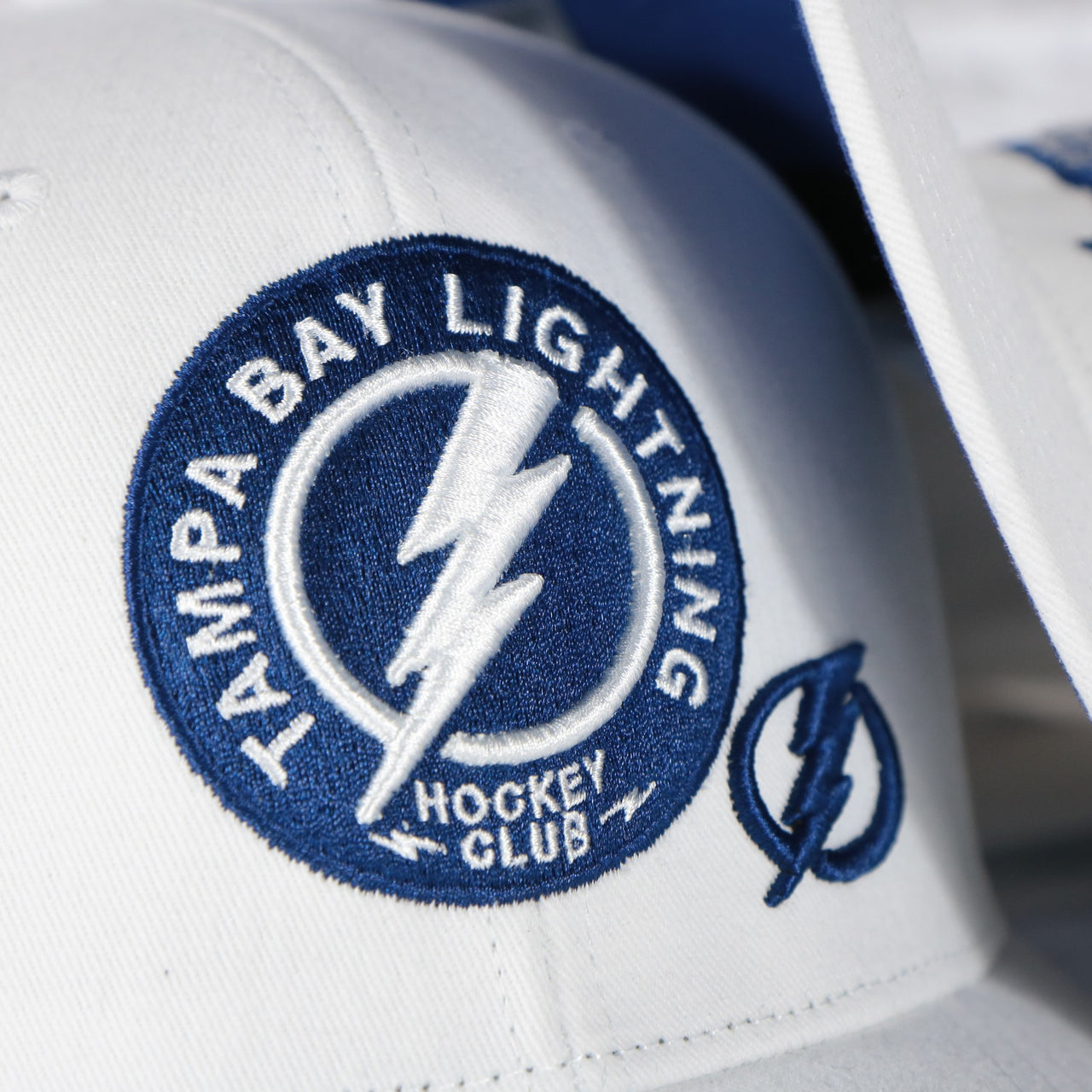 lightning logo on the Tampa Bay Lightning NHL All in Pro Blue Bottom | White Snapback Hat
