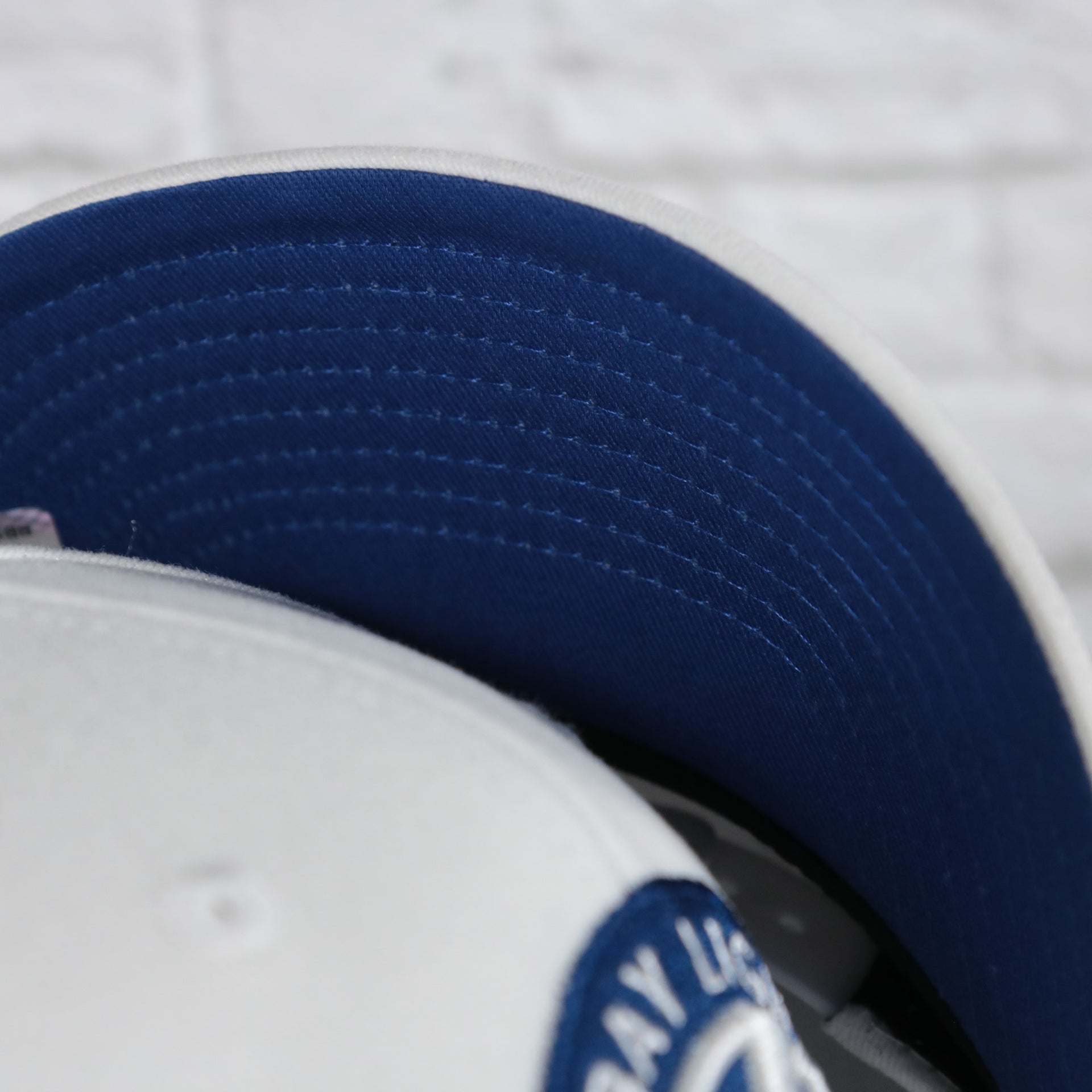 blue under visor on the Tampa Bay Lightning NHL All in Pro Blue Bottom | White Snapback Hat