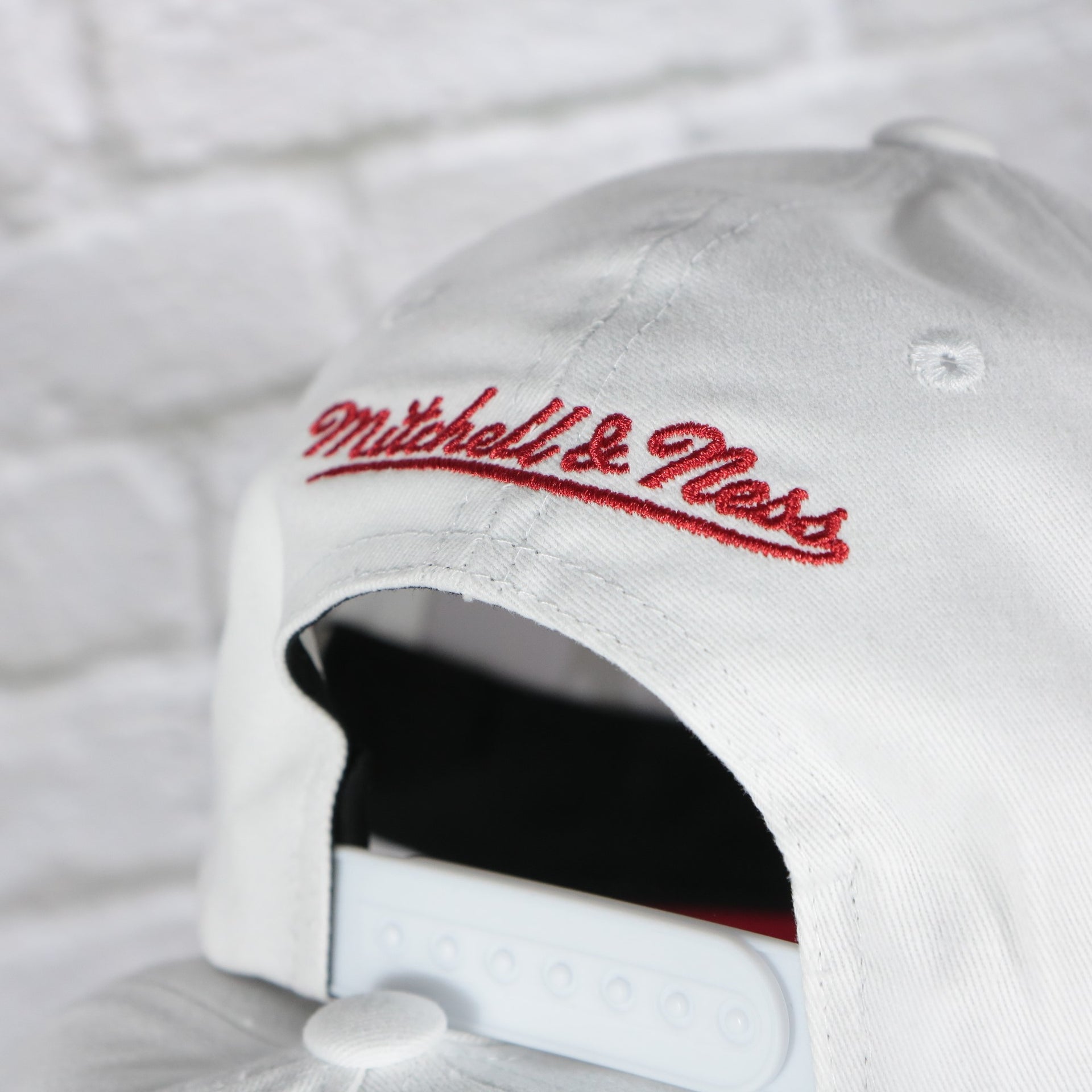 mitchell and ness logo on the Chicago Blackhawks NHL All in Pro Red Bottom | White Snapback Hat