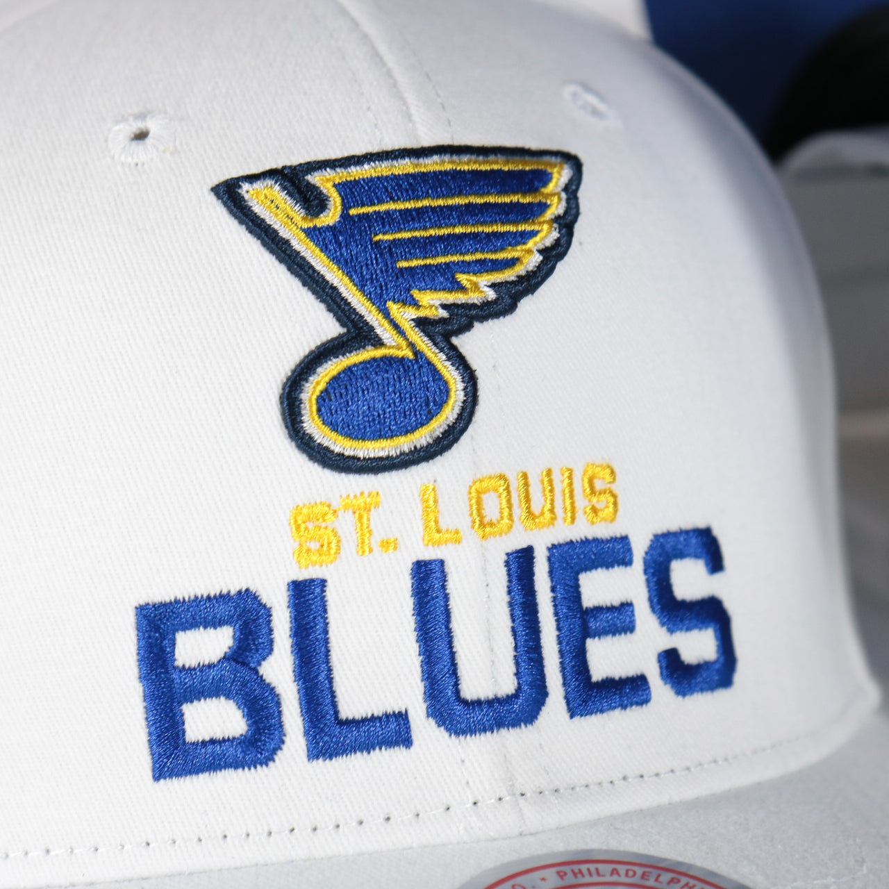 blues logo on the St. Louis Blues NHL All in Pro Blue Bottom | White Snapback Hat